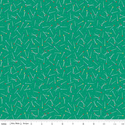 Image of Hand Made Pins Green quilting cotton fabric by Amber Kemp-Gerstel for Riley Blake Designs. Features pins on a green background. Cute Little Fabric Shop