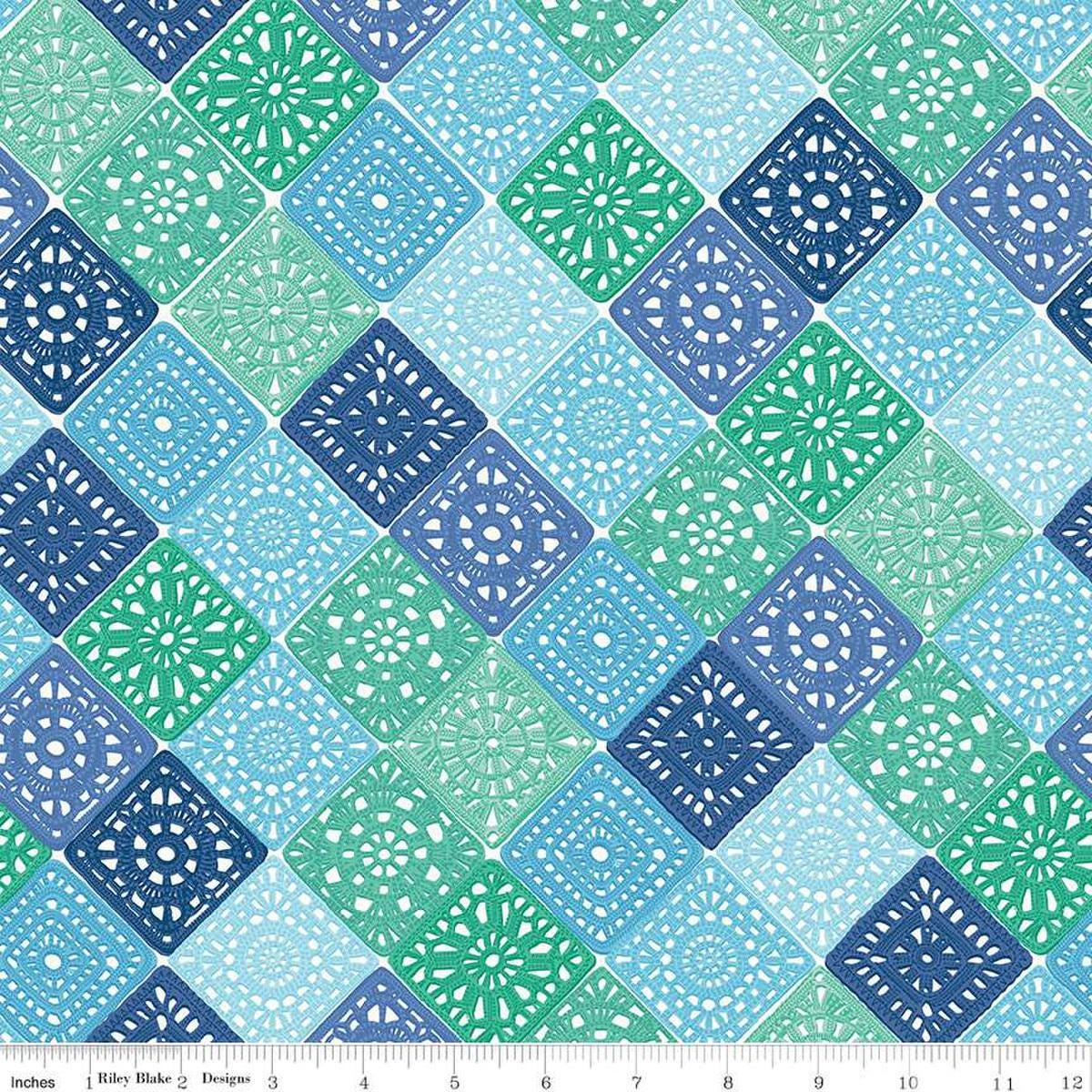 Image of Hand Made Crochet Blue quilting cotton fabric by Amber Kemp-Gerstel for Riley Blake Designs. Features granny squares on a blue background. Cute Little Fabric Shop