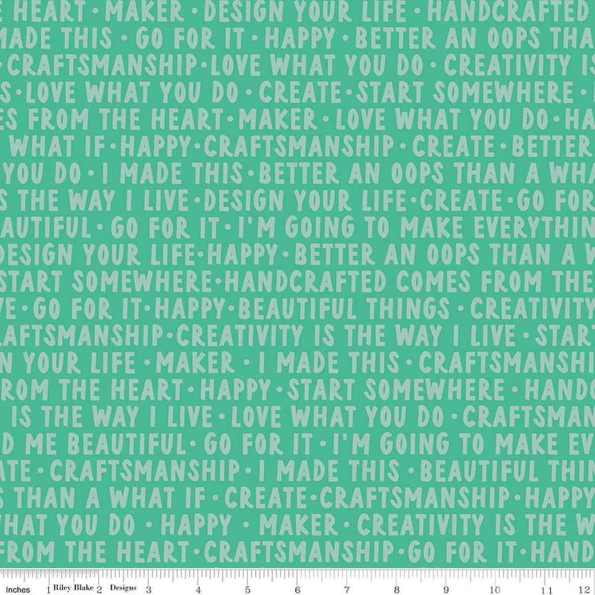 Image of Hand Made Words Alpine quilting cotton fabric by Amber Kemp-Gerstel for Riley Blake Designs. Features words on a green background. Cute Little Fabric Shop