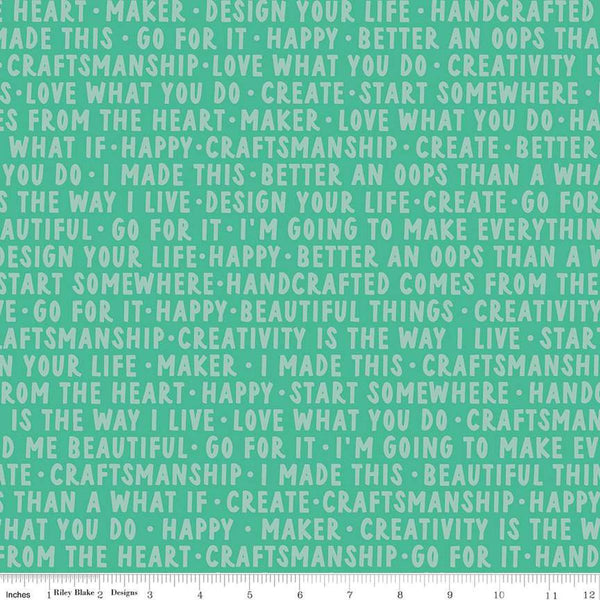 Image of Hand Made Words Alpine quilting cotton fabric by Amber Kemp-Gerstel for Riley Blake Designs. Features words on a green background. Cute Little Fabric Shop