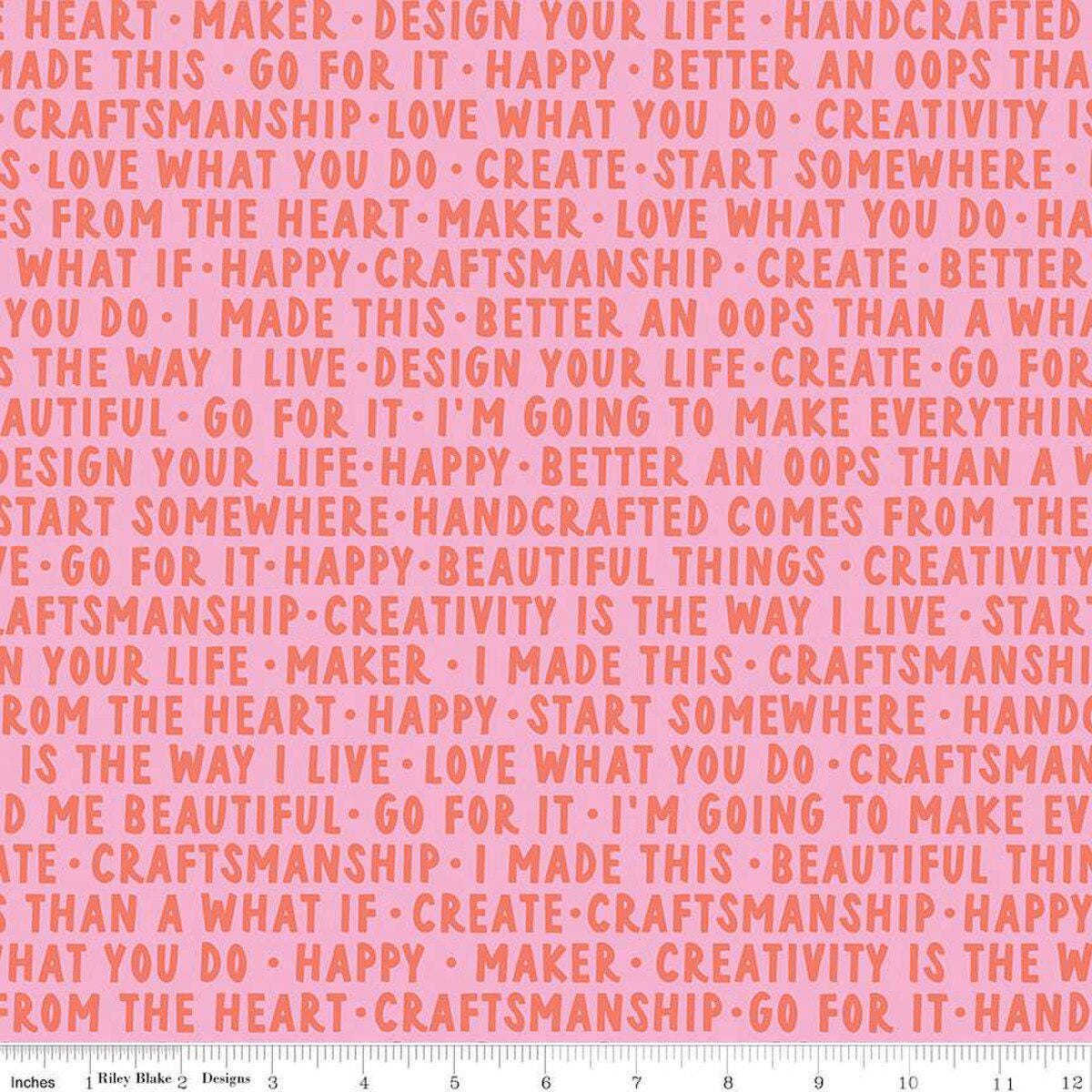 Image of Hand Made Words Pink quilting cotton fabric by Amber Kemp-Gerstel for Riley Blake Designs. Features words on a pink background. Cute Little Fabric Shop