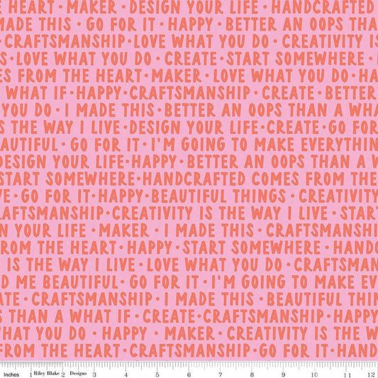 Image of Hand Made Words Pink quilting cotton fabric by Amber Kemp-Gerstel for Riley Blake Designs. Features words on a pink background. Cute Little Fabric Shop