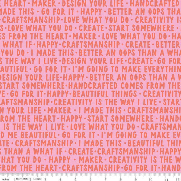 Image of Hand Made Words Pink quilting cotton fabric by Amber Kemp-Gerstel for Riley Blake Designs. Features words on a pink background. Cute Little Fabric Shop