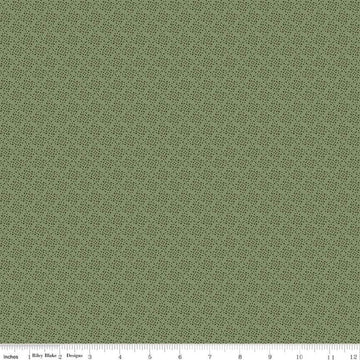 Image of Juju's Petals Dots Green quilting cotton fabric by Judi Madsen for Riley Blake Designs. Features dots on a green background. Cute Little Fabric Shop