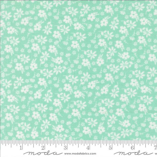 Image of Delightfully Yours Blossoms Aqua quilting cotton fabric by Sherri & Chelsi for Moda Fabrics. Features flowers on a blue background. Cute Little Fabric Shop