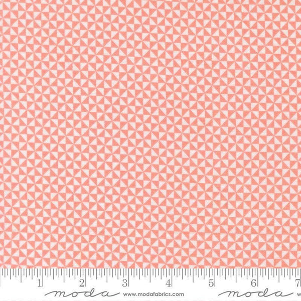 Image of Delightfully Yours Pinwheel Carnation quilting cotton fabric by Sherri & Chelsi for Moda Fabrics. Features triangles on a red background. Cute Little Fabric Shop