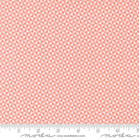 Image of Delightfully Yours Pinwheel Carnation quilting cotton fabric by Sherri & Chelsi for Moda Fabrics. Features triangles on a red background. Cute Little Fabric Shop