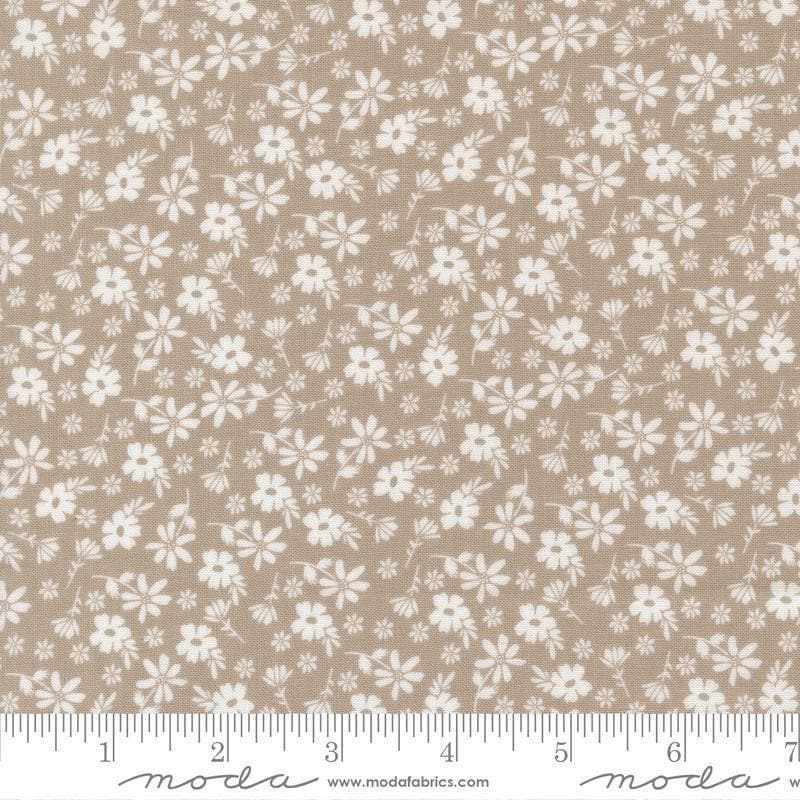 Image of Delightfully Yours Blossoms Stone quilting cotton fabric by Sherri & Chelsi for Moda Fabrics. Features flowers on a gray background. Cute Little Fabric Shop
