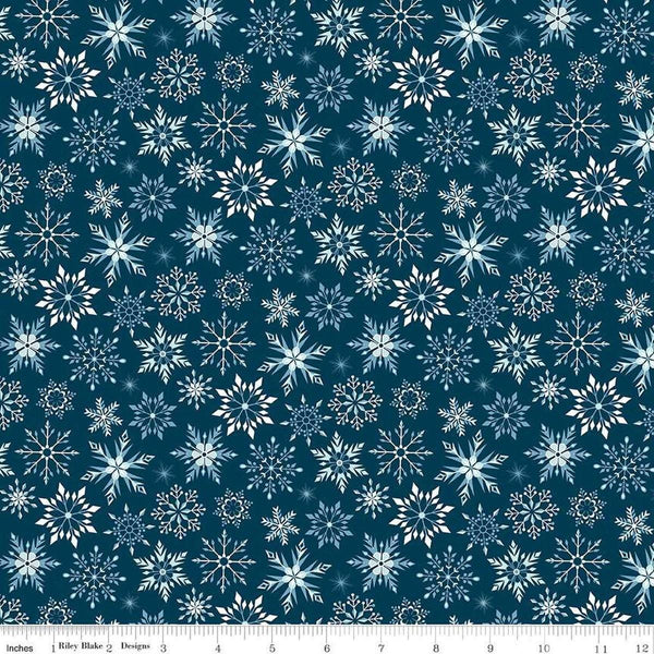 Image of Flannel Winter Magic Magic Snowflakes Navy flannel cotton fabric by Dani Mogstad for Riley Blake Designs. Features snowflakes on a blue background. Cute Little Fabric Shop