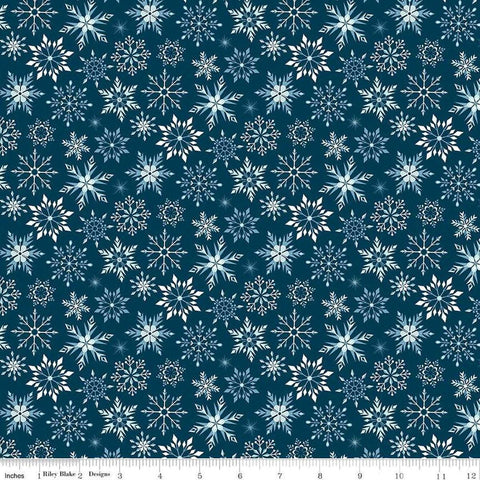 Image of Flannel Winter Magic Magic Snowflakes Navy flannel cotton fabric by Dani Mogstad for Riley Blake Designs. Features snowflakes on a blue background. Cute Little Fabric Shop