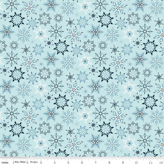 Image of Flannel Winter Magic Magic Snowflakes Aqua flannel cotton fabric by Dani Mogstad for Riley Blake Designs. Features snowflakes on a blue background. Cute Little Fabric Shop