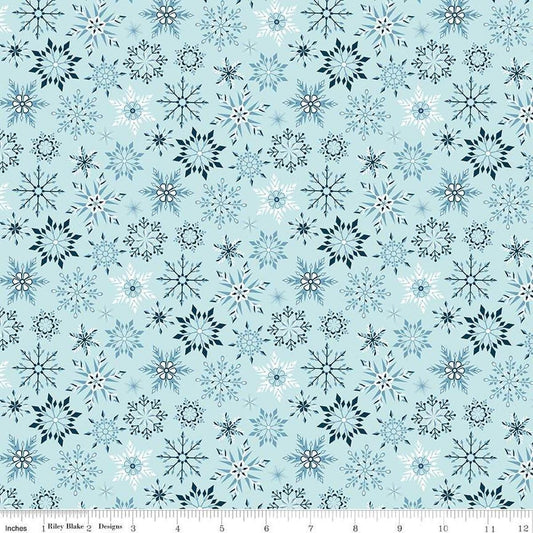 Image of Flannel Winter Magic Magic Snowflakes Aqua flannel cotton fabric by Dani Mogstad for Riley Blake Designs. Features snowflakes on a blue background. Cute Little Fabric Shop
