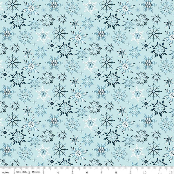 Image of Flannel Winter Magic Magic Snowflakes Aqua flannel cotton fabric by Dani Mogstad for Riley Blake Designs. Features snowflakes on a blue background. Cute Little Fabric Shop