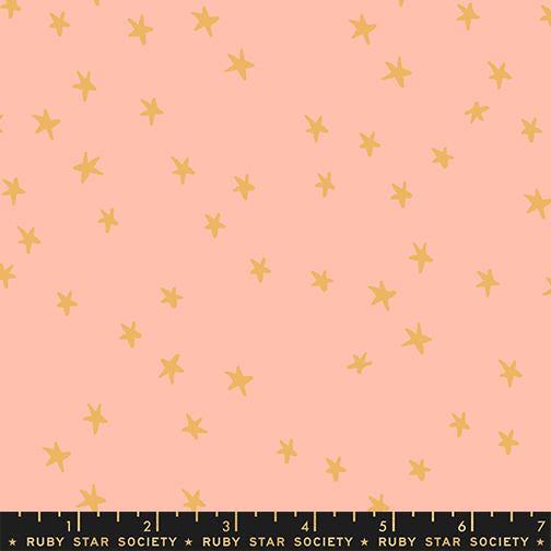 Image of the Starry New Blender Stars Peach quilting cotton fabric by Ruby Star Society for Moda Fabrics. Features small stars on a coral background. Cute Little Fabric Shop