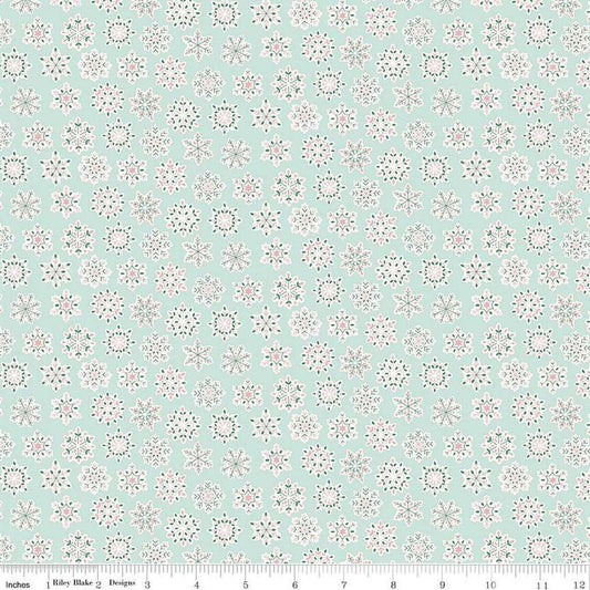 Image of Festive Greetings Snow Season quilting cotton fabric by Liberty Fabrics for Riley Blake Designs. Features snowflakes on a blue background. Cute Little Fabric Shop