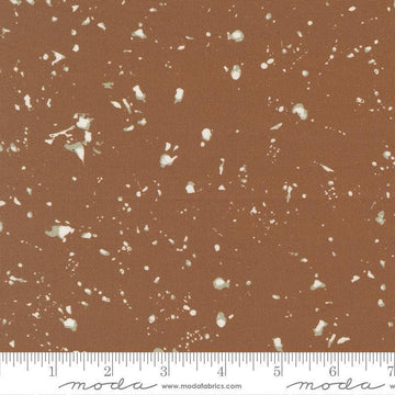 Image of the For My Boys Oliver Splatter Coco quilting cotton fabric by Sewn By Amy Schelle for Moda Fabrics. Features splatters on a brown background. Cute Little Fabric Shop