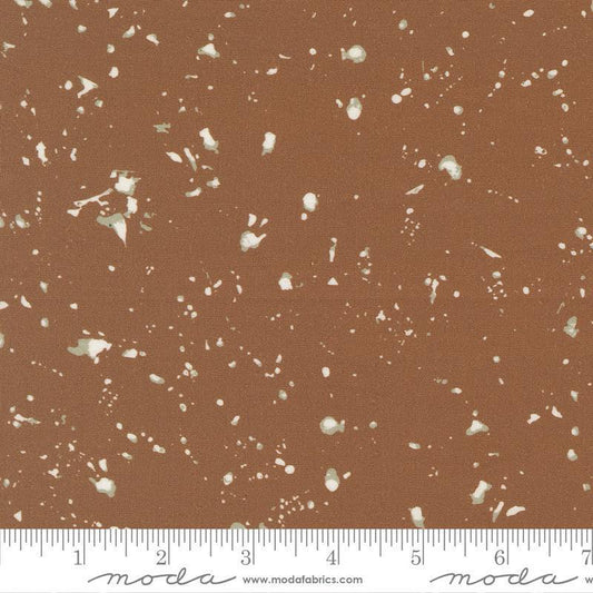 Image of the For My Boys Oliver Splatter Coco quilting cotton fabric by Sewn By Amy Schelle for Moda Fabrics. Features splatters on a brown background. Cute Little Fabric Shop