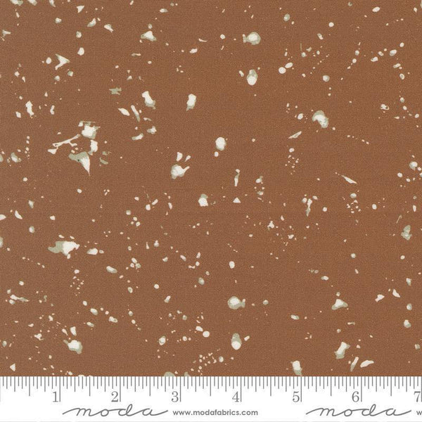 Image of the For My Boys Oliver Splatter Coco quilting cotton fabric by Sewn By Amy Schelle for Moda Fabrics. Features splatters on a brown background. Cute Little Fabric Shop