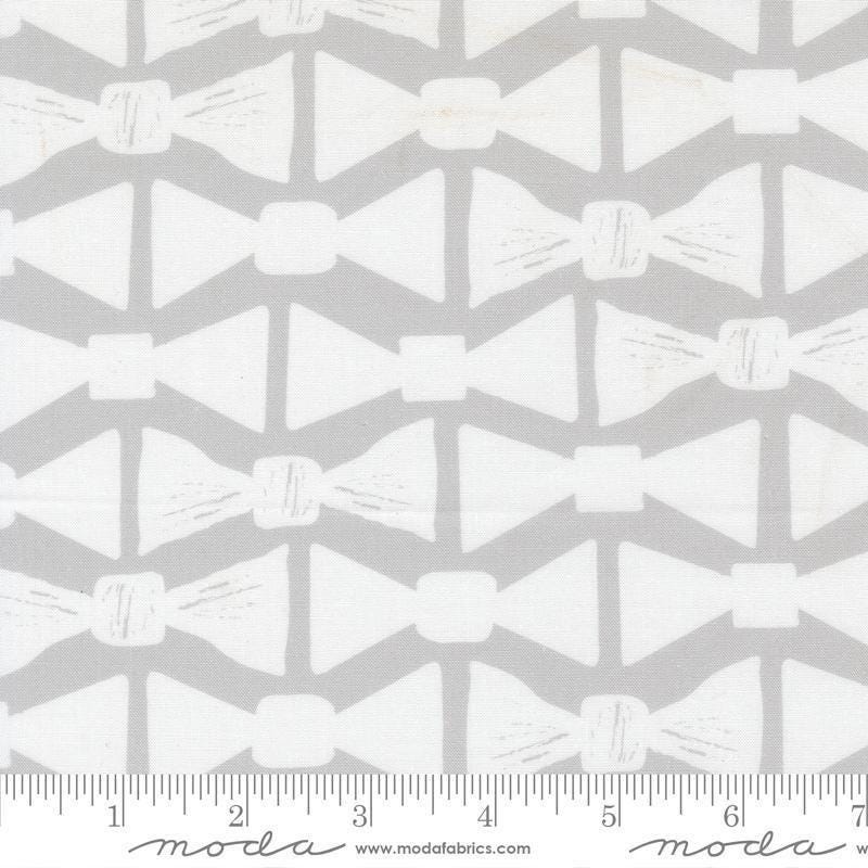 Image of the For My Boys Henry Bowtie Silver quilting cotton fabric by Amy Schelle for Moda Fabrics. Features bowties on a gray background. Cute Little Fabric Shop.
