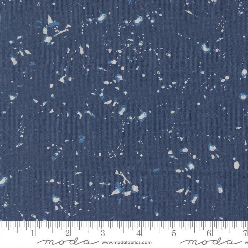 Image of the For My Boys Henry Splatter Navy quilting cotton fabric by Amy Schelle for Moda Fabrics. Features paint splatter on a blue background. Cute Little Fabric Shop.