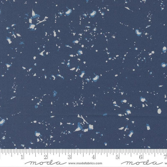 Image of the For My Boys Henry Splatter Navy quilting cotton fabric by Amy Schelle for Moda Fabrics. Features paint splatter on a blue background. Cute Little Fabric Shop.