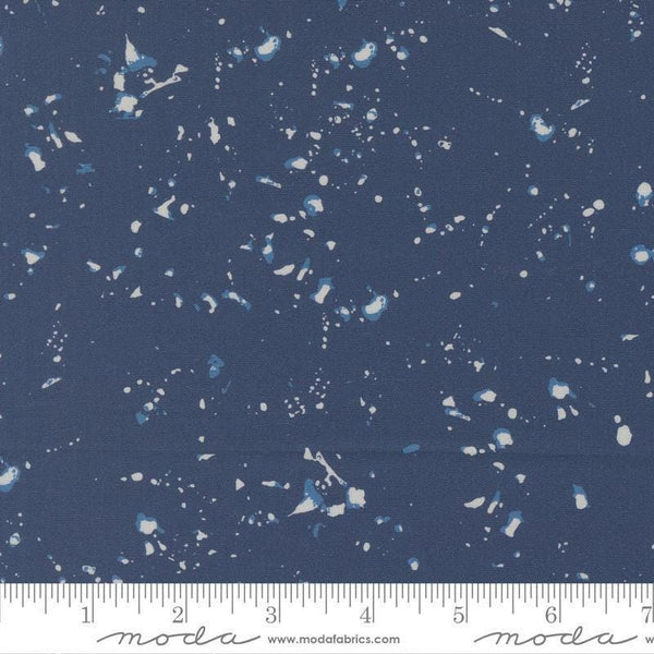 Image of the For My Boys Henry Splatter Navy quilting cotton fabric by Amy Schelle for Moda Fabrics. Features paint splatter on a blue background. Cute Little Fabric Shop.