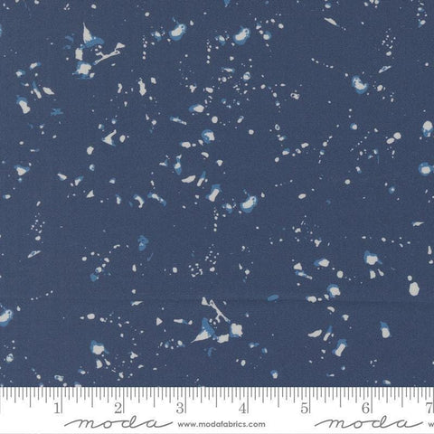 Image of the For My Boys Henry Splatter Navy quilting cotton fabric by Amy Schelle for Moda Fabrics. Features paint splatter on a blue background. Cute Little Fabric Shop.