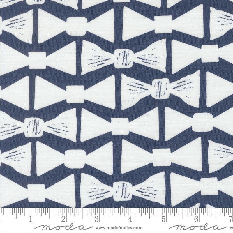 Image of the For My Boys Henry Bowtie Navy quilting cotton fabric by Amy Schelle for Moda Fabrics. Features bowties on a blue background. Cute Little Fabric Shop.