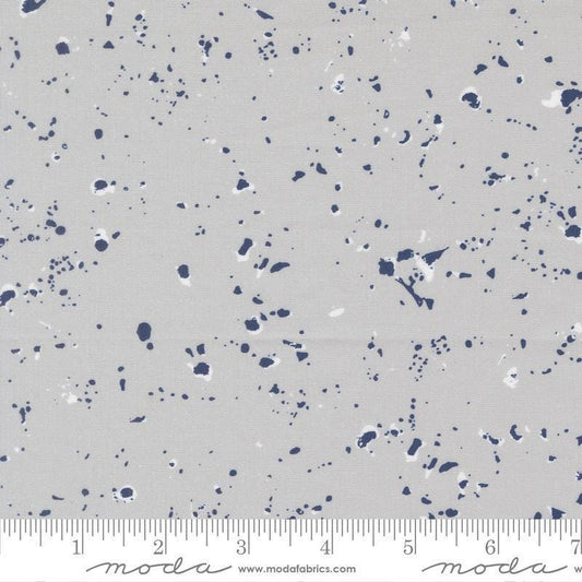 Image of the For My Boys Henry Splatter Silver quilting cotton fabric by Amy Schelle for Moda Fabrics. Features paint splatter on a gray background. Cute Little Fabric Shop.