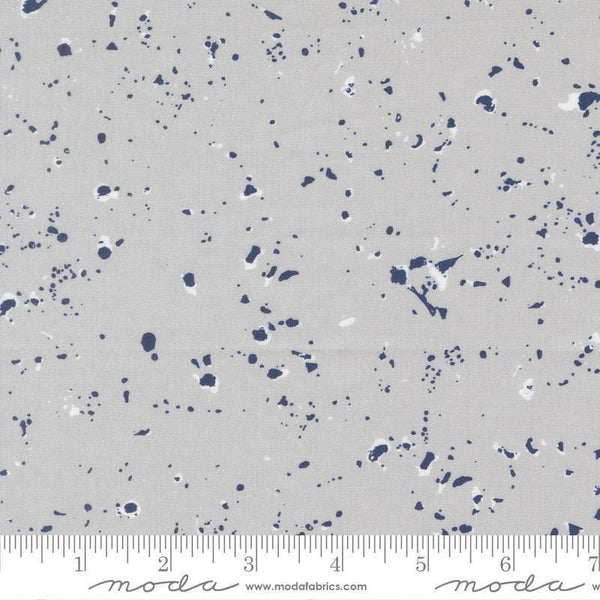 Image of the For My Boys Henry Splatter Silver quilting cotton fabric by Amy Schelle for Moda Fabrics. Features paint splatter on a gray background. Cute Little Fabric Shop.