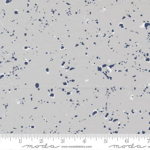 Image of the For My Boys Henry Splatter Silver quilting cotton fabric by Amy Schelle for Moda Fabrics. Features paint splatter on a gray background. Cute Little Fabric Shop.