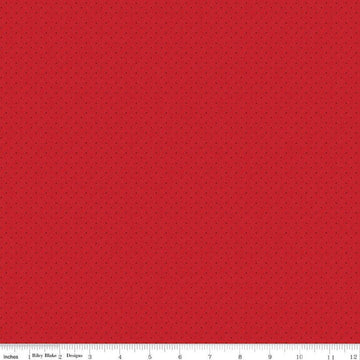 Image of the American Jane Pindots Brick quilting cotton fabric by American Jane for Riley Blake Designs. Features tiny dots on a red background. Cute Little Fabric Shop
