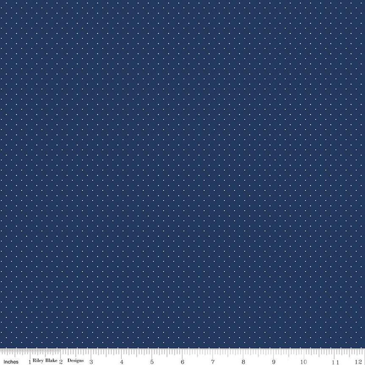 Image of the American Jane Pindots Navy quilting cotton fabric by American Jane for Riley Blake Designs. Features tiny dots on a blue background. Cute Little Fabric Shop