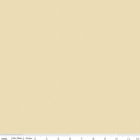 Image of the American Jane Pindots Sand quilting cotton fabric by American Jane for Riley Blake Designs. Features tiny dots on a cream background. Cute Little Fabric Shop