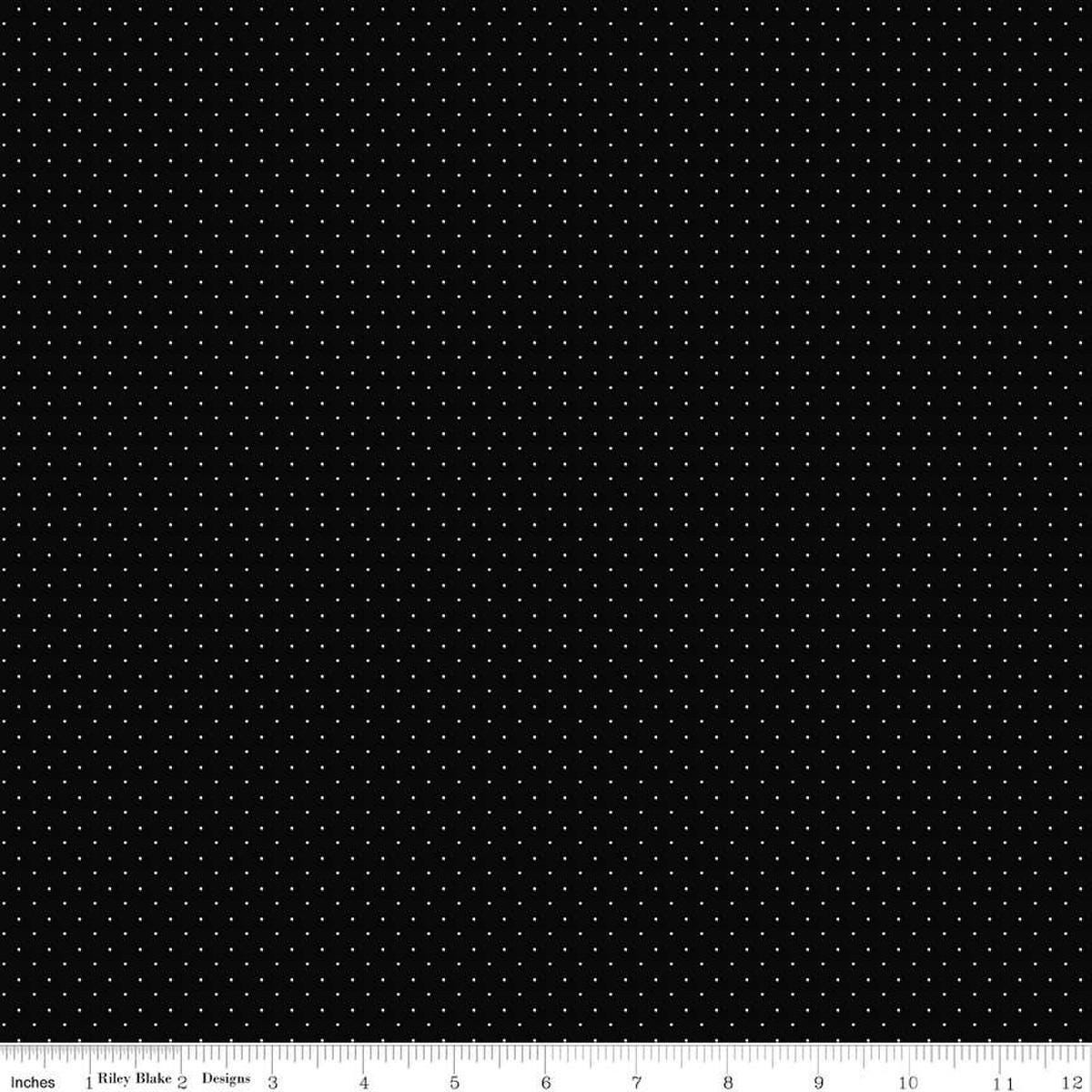 Image of the American Jane Pindots Black quilting cotton fabric by American Jane for Riley Blake Designs. Features tiny dots on a black background. Cute Little Fabric Shop