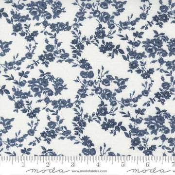Image of the Nantucket Summer Surfside Cream Navy quilting cotton fabric by Camille Roskelley for Moda Fabrics. Features flowers on a blue background. Cute Little Fabric Shop