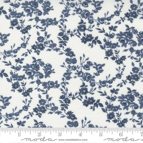 Image of the Nantucket Summer Surfside Cream Navy quilting cotton fabric by Camille Roskelley for Moda Fabrics. Features flowers on a blue background. Cute Little Fabric Shop