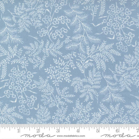Image of the Nantucket Summer Dots Light Blue quilting cotton fabric by Camille Roskelley for Moda Fabrics. Features flowers on a blue background. Cute Little Fabric Shop