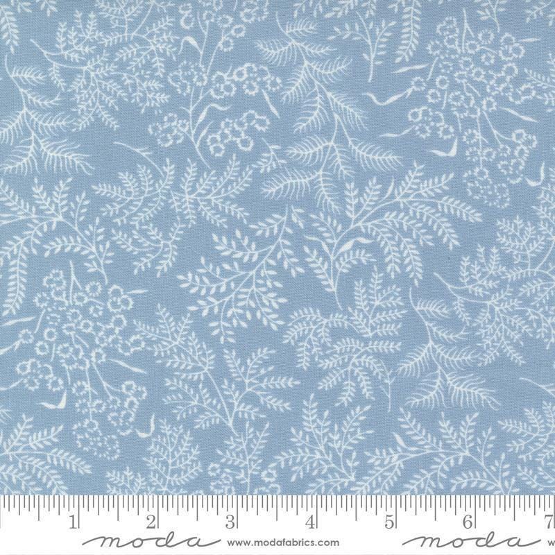 Image of the Nantucket Summer Dots Light Blue quilting cotton fabric by Camille Roskelley for Moda Fabrics. Features flowers on a blue background. Cute Little Fabric Shop