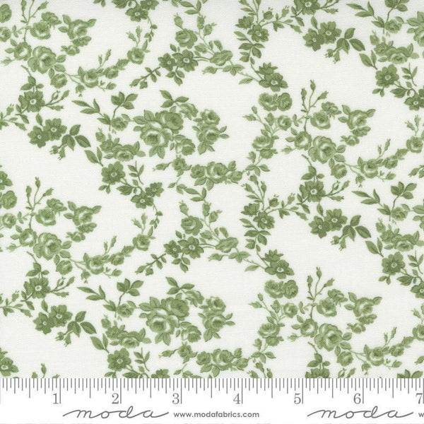 Image of the Nantucket Summer Surfside Cream Grass quilting cotton fabric by Camille Roskelley for Moda Fabrics. Features flowers on a grass background. Cute Little Fabric Shop