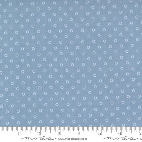 Image of the Nantucket Summer Dots Light Blue quilting cotton fabric by Camille Roskelley for Moda Fabrics. Features circles on a blue background. Cute Little Fabric Shop