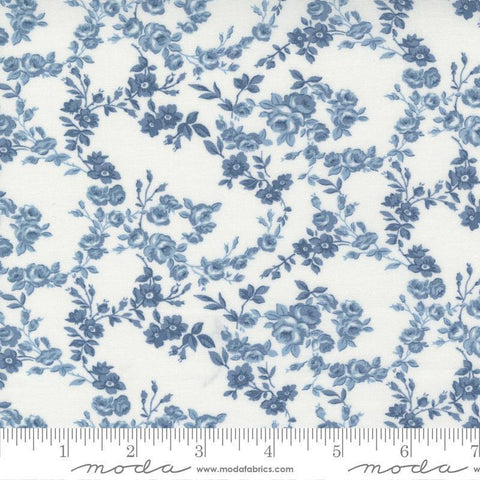 Image of the Nantucket Summer Surfside Cream Blue quilting cotton fabric by Camille Roskelley for Moda Fabrics. Features flowers on a blue background. Cute Little Fabric Shop