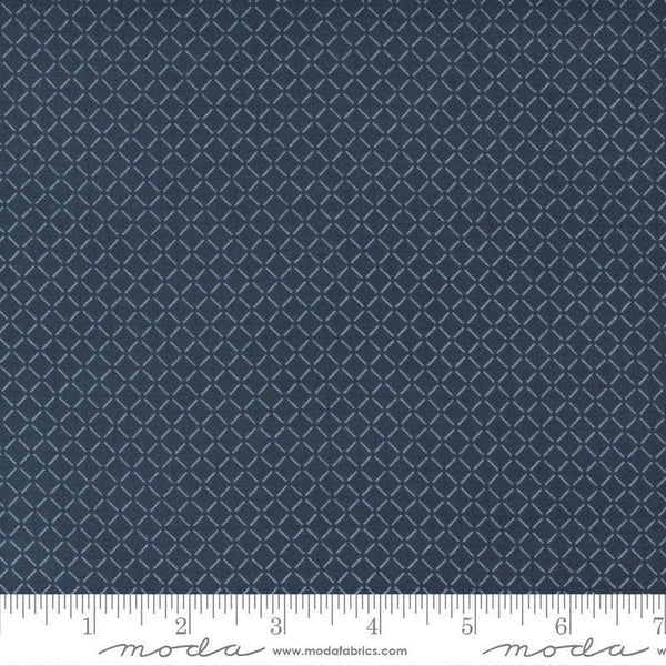 Image of the Nantucket Summer Sail Navy quilting cotton fabric by Camille Roskelley for Moda Fabrics. Features squares on a blue background. Cute Little Fabric Shop