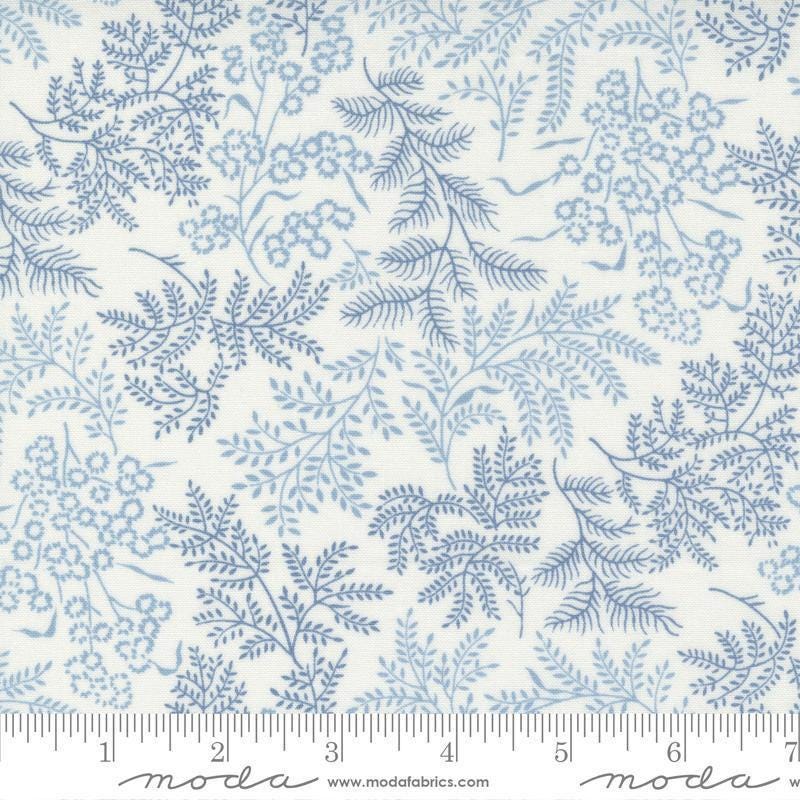 Image of the Nantucket Summer Dots Cream Blue quilting cotton fabric by Camille Roskelley for Moda Fabrics. Features flowers on a blue background. Cute Little Fabric Shop