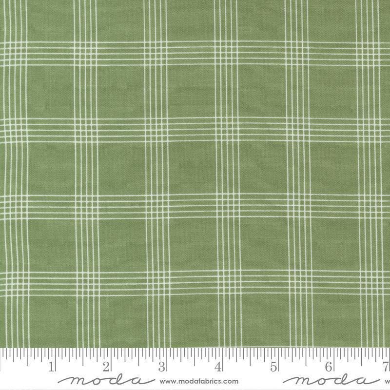 Image of the Nantucket Summer Checks Grass quilting cotton fabric by Camille Roskelley for Moda Fabrics. Features plaid on a green background. Cute Little Fabric Shop