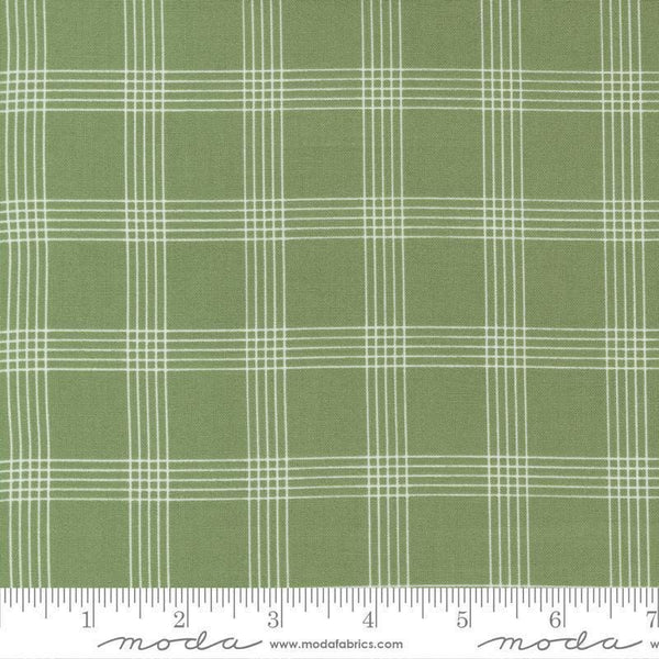 Image of the Nantucket Summer Checks Grass quilting cotton fabric by Camille Roskelley for Moda Fabrics. Features plaid on a green background. Cute Little Fabric Shop