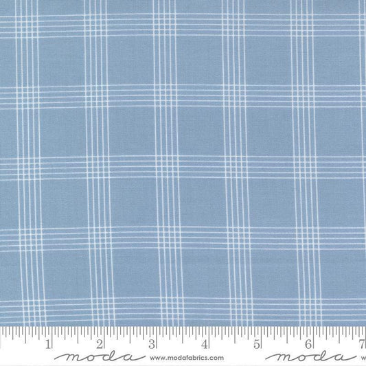 Image of the Nantucket Summer Checks Light Blue quilting cotton fabric by Camille Roskelley for Moda Fabrics. Features plaid on a blue background. Cute Little Fabric Shop