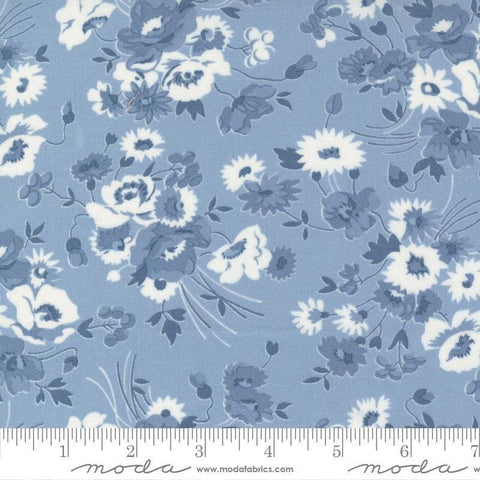 Image of the Nantucket Summer Florals Light Blue quilting cotton fabric by Camille Roskelley for Moda Fabrics. Features florals on a blue background. Cute Little Fabric Shop