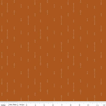 Image of Olive Grove Arrows Terracotta quilting cotton fabric by Amber Elliot for Riley Blake Designs. Features arrows on an orange background. Cute Little Fabric Shop