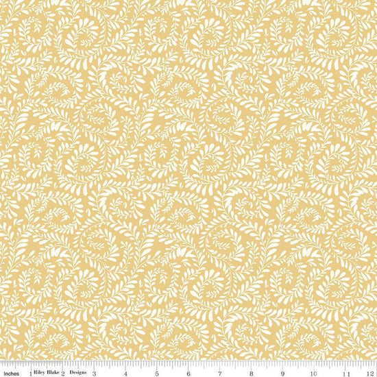 Image of Sunflower Whispers Ferns Yellow quilting cotton fabric by Lisa Audit for Riley Blake Designs. Features leaves on a yellow background. Cute Little Fabric Shop